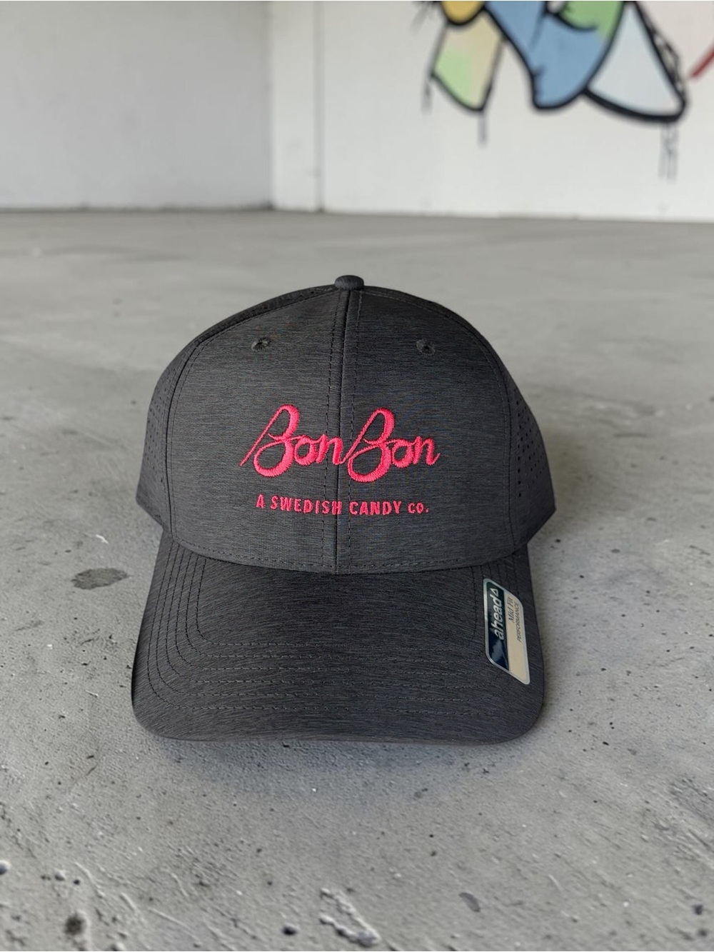 BonBon Embroidered Black Hat with Pink Logo
